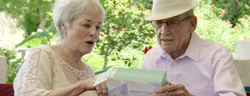 Senior couple looking at a MedBox