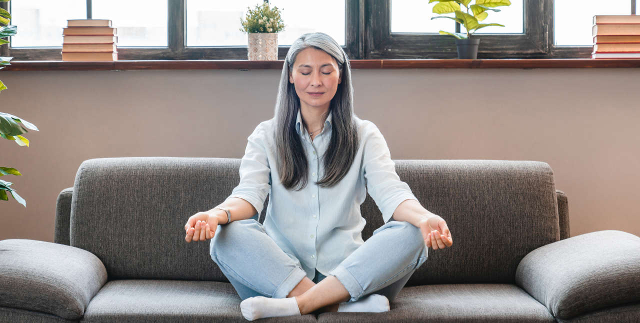 Senior woman practicing meditation for stress management